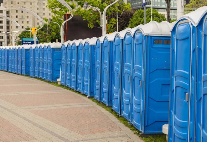 a row of portable restrooms at a fairground, offering visitors a clean and hassle-free experience in eastmountain